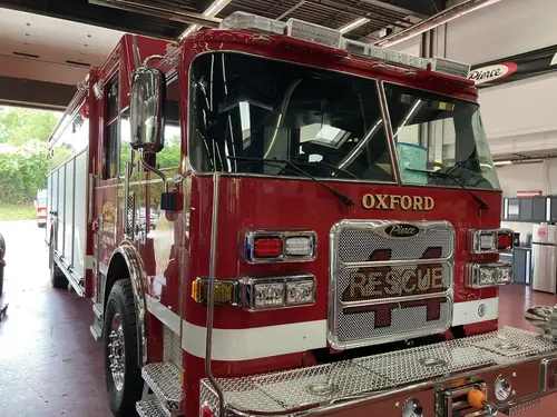 Front-left exterior close view showing grille, bumper, and cab