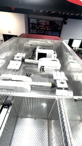 Top hosebed view showing diamond-plate deck and hosebed divider layout