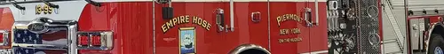 Body side lettering close-up strip on red panel