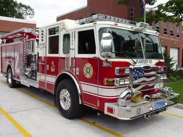 Front-right exterior view showing cab and side body compartments