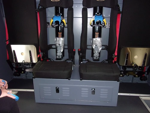 Rear crew interior view showing SCBA seats and storage box mounts