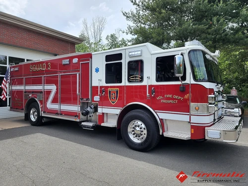 Rescue pumper front-left exterior view showing enclosed cab and long body