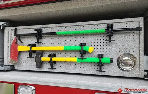 Open side compartment showing mounted hand tools in horizontal rack