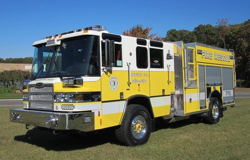 Front-left exterior profile view showing grille, bumper, and side body