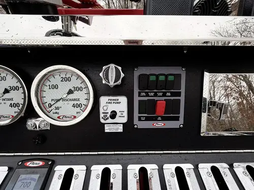 Pump control close-up showing dial knob and indicator lights
