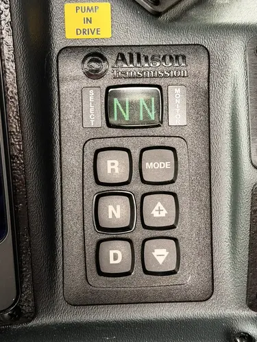 Cab switch panel close-up showing ENG BRK and scene light buttons