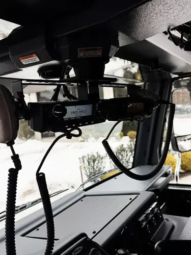Cab interior wide view showing front seats, center console, and dashboard