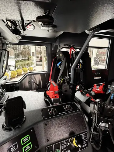 Cab door panel close-up showing storage pocket and trim hardware