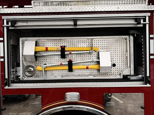 Open side compartment showing hand tools, containers, and shelf dividers