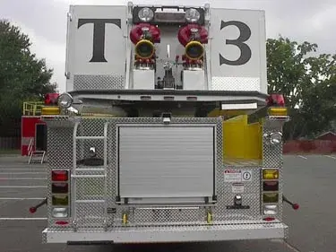 Rear view showing rear compartment, upper intakes, and warning lights
