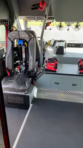 Cab interior view showing rear seat and center aisle