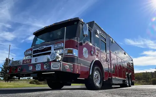 Heavy rescue truck front-left exterior view with full side body visible