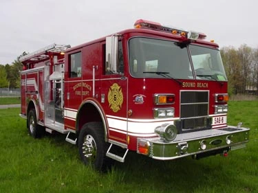 Pumper front-left exterior view showing cab, bumper, and side compartments