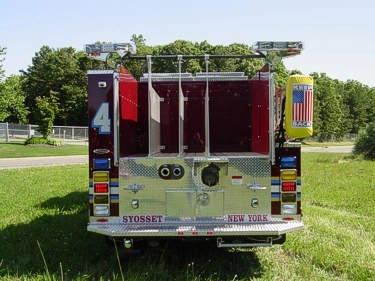 Rear view showing rear panel, warning lights, and hosebed divider fins