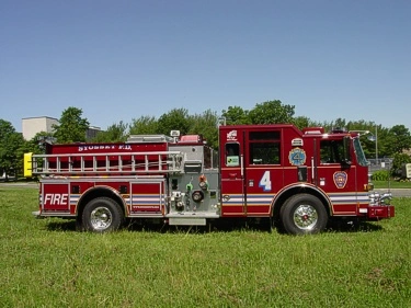 Driver-side profile view showing side body and pump panel area