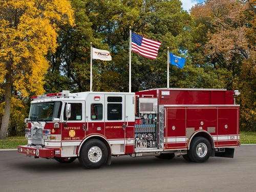 Taftville fire engine driver-side profile showing pump panel controls and side compartments