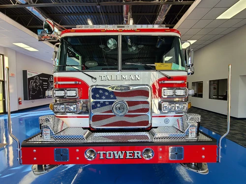 Head-on front view showing grille and American-flag style front panel
