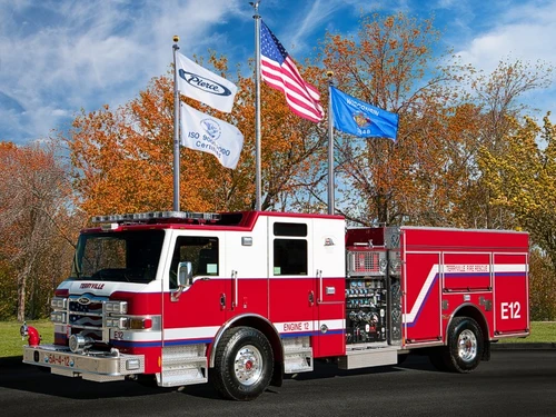 Terryville fire engine front-left exterior view with enclosed cab and side compartments