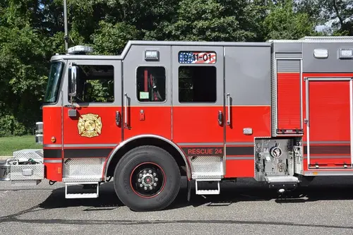 Cab-side profile showing enclosed cab and rear body section