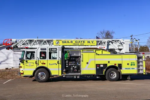 Vails Gate Pierce Ascendant quint full driver-side profile view with the aerial ladder and side compartments