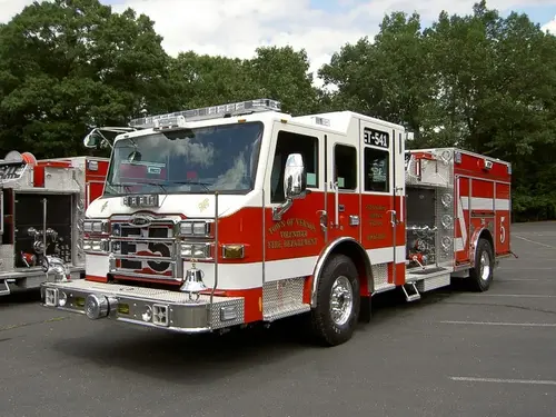 Pumper front-left exterior view showing cab and side body
