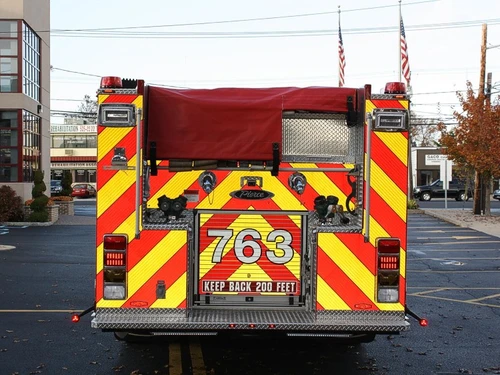 Rear view showing chevrons and upper hosebed opening
