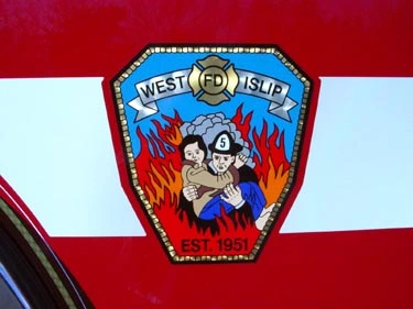 Shield logo close-up on red and white side panel