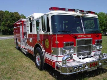 Front-right exterior view showing grille, bumper, and side body
