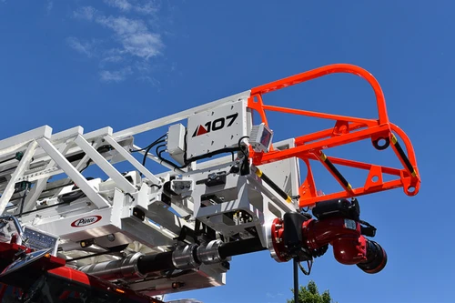Ladder tip close-up showing red platform framework and aerial sections