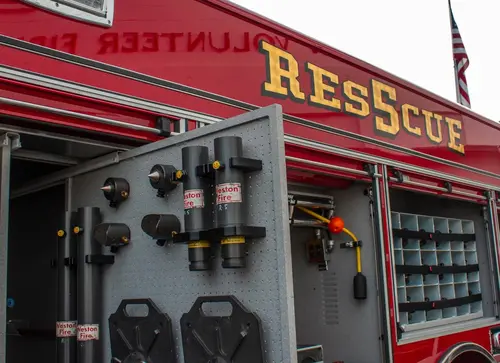 Weston Pierce heavy rescue rear tool tray deployed with chainsaws and rescue saws