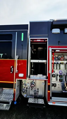 Open mid-body compartment showing shelves and pump-side connections