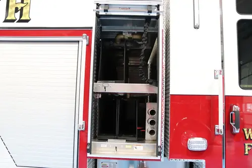 Open narrow side compartment showing vertical storage channel and shelf space