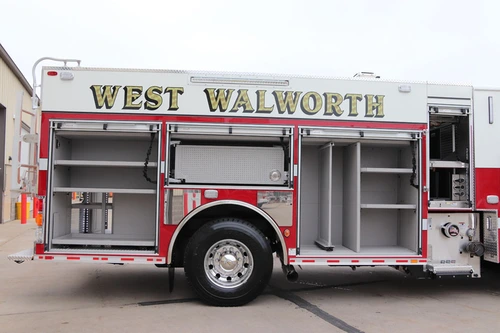Officer-side profile view with open side compartments and wheel area