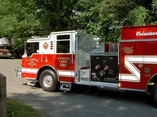 Driver-side profile view showing pump panel area and wheelbase