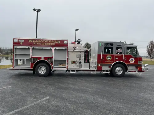 Officer-side full profile view showing open side compartments and pump controls