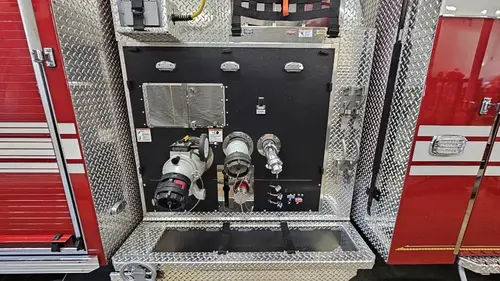 Pump-side panel close-up showing intake fittings and large control knobs