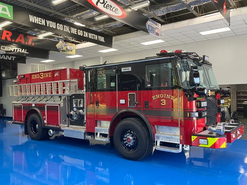 Pumper front-left exterior view showing grille, bumper, and side body