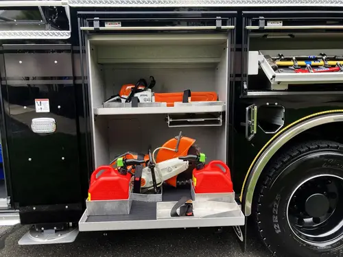 Open side compartment showing mounted hand tools and adapters