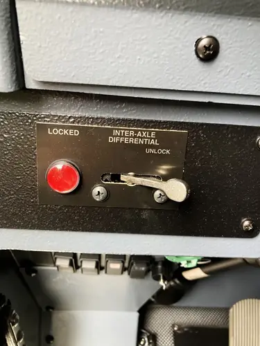 Cab interior view showing dashboard, center controls, and front windshield